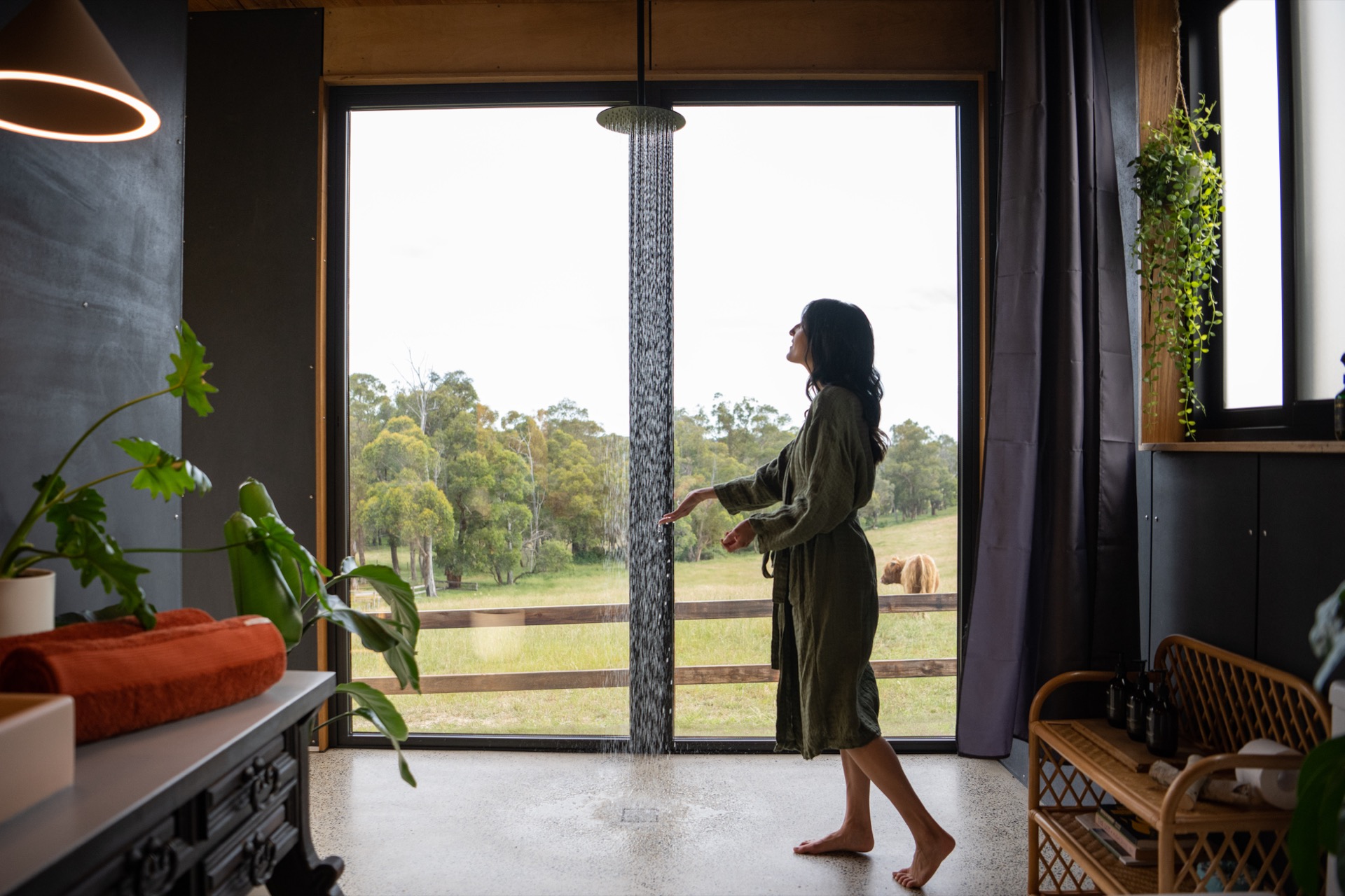 Interior of Casa Luna with floor-to-ceiling windows and queen bed