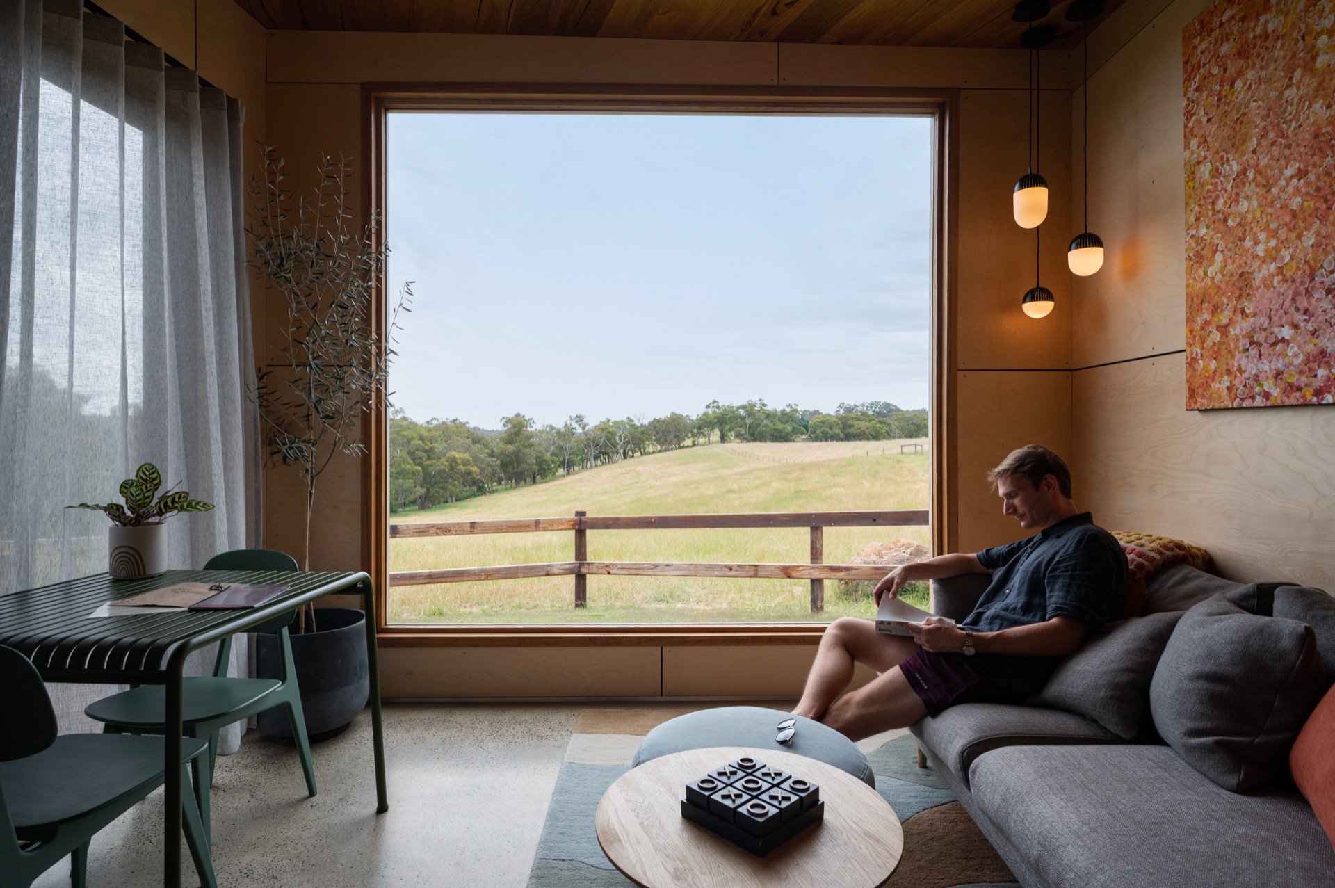 Casa Luna exterior at sunset with golden light across the Adelaide Hills